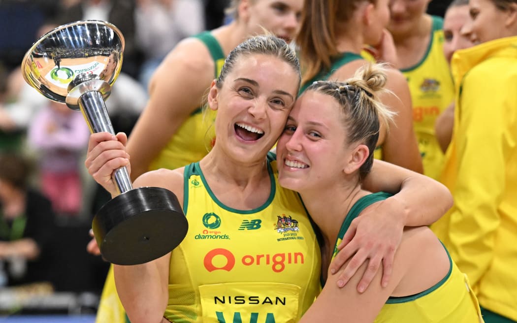 Captain Liz Watson and Jamie-Lee Price of Australia celebrate with the Constellation Cup following their recent win over the Silver Ferns.