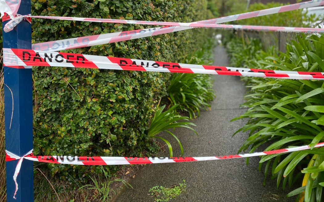 An access path to Charcoal Bay via the Rosecamp Road Foreshore Reserve in Auckland is blocked off due to slips.