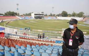 A Pakistani security forces personnel is seen in the cricket stadium following the cancellation of cricket series between Pakistan and New Zealand, in Rawalpindi, Pakistan, on September 17, 2021.