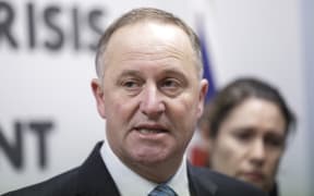 Media conference in the bunker at Parliament. John Key speaks to media.