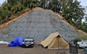 About 20 protesters broke through security fencing at Mt Messenger five days ago and have set up camp at the summit, erecting tents and a kitchen.