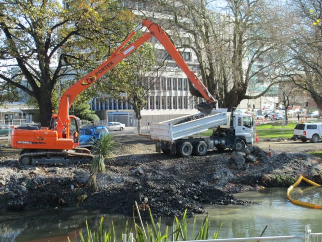 Quake repair work continues on the banks of the Avon River.