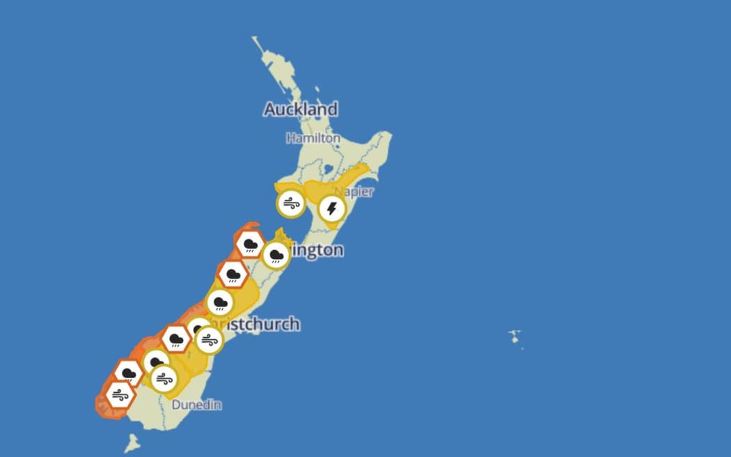 A map of New Zealand showing heavy rain and severe wind warnings for the South Island.
