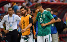 Germany's forward Thomas Mueller (right) at the end of the Group F match against South Korea.