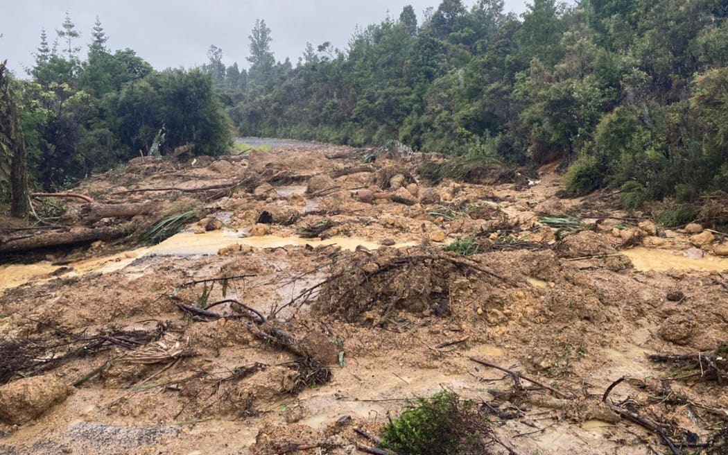 A slip across the road at Sailors Grave, near Tairua, during Cyclone Gabrielle. 14/2/23