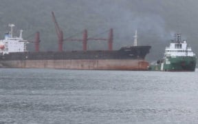 The North Korean cargo ship, Wise Honest, now anchored just off Utulei village shoreline