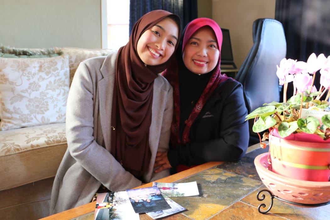 Surprised by Nurul's decision to enter the pageant, mum Anie at home with Nurul (right).