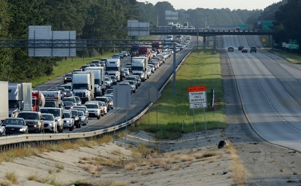 Southbound lanes of I-95 near the Georgia-South Carolina border are empty as northbound lanes are packed as people evacuate ahead of the arrival of Hurricane Irma.