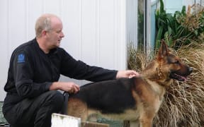 Senior Constable Bruce Lamb and his dog Gage.