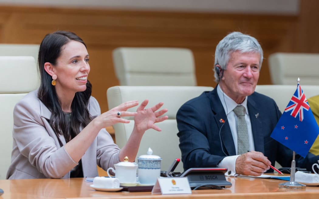 Prime Minister Jacinda Ardern  and Trade Minister Damien O'Connor listen to opening remarks from Vietnamese Prime Minister Pham Minh Chinh (not pictured) in brief talks ahead of signing two agreements on aviation cooperation and working holiday visas, 14 November 2022.