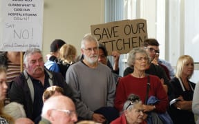 About 100 people gathered in the public gallery to oppose the hospital kitchen outsourcing.