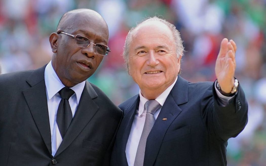 Former FIFA vice president Jack Warner (left) and outgoing FIFA president Sepp Blatter.