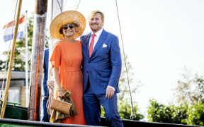 King Willem-Alexander of the Netherlands (R) and Queen Maxima of the Netherlands pose