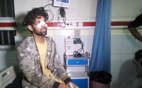 A man receives treatment for his injures at Wazir Akbar Khan hospital after a massive explosion rocked Kabul late on 28 November.