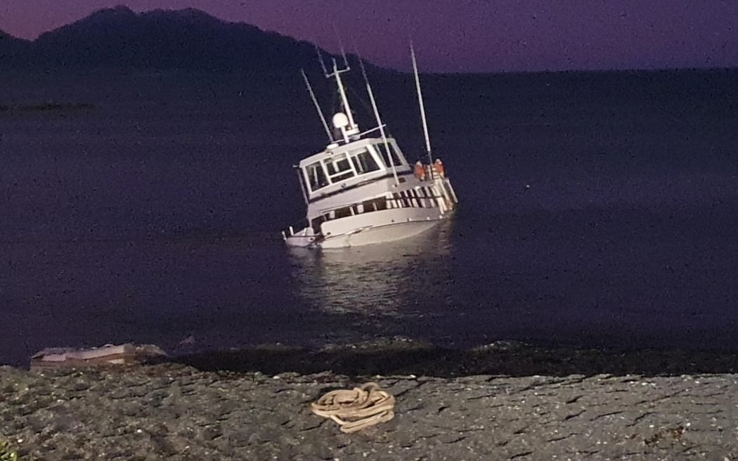 The boat carrying a family of four became grounded off the Kaikōura coast on Sunday.