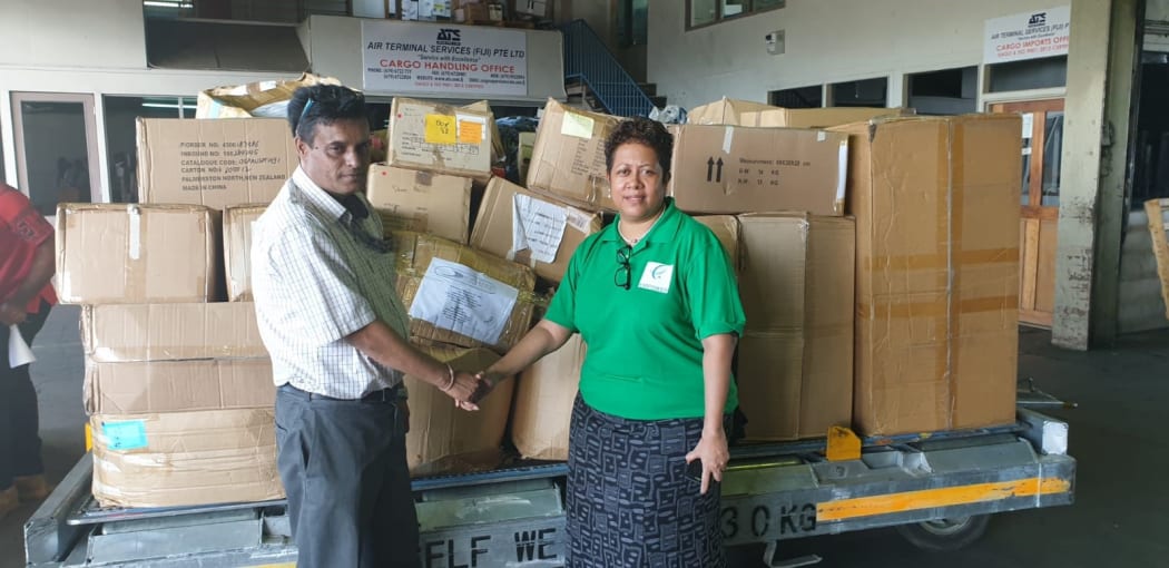 Mohinesh Narayan a Customs Fiji Clearance agent and Millie Lakokinakeba of Empower Development Fiji