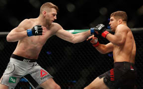 Auckland MMA fighter Dan Hooker wins war at UFC 290