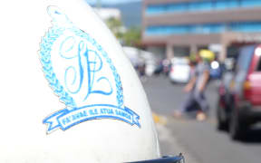 The Samoa Police crest on a patrol bike in downtown Apia.