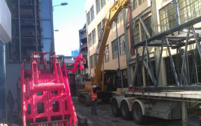 The nine storey lift shaft on Lukes Lane in Wellington was demolished after being deemed too dangerous in an earthquake.