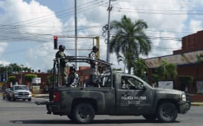 Members of the National Guard patrol a street in Culiacan, Sinaloa state, Mexico, on October 18, 2019. - army, military