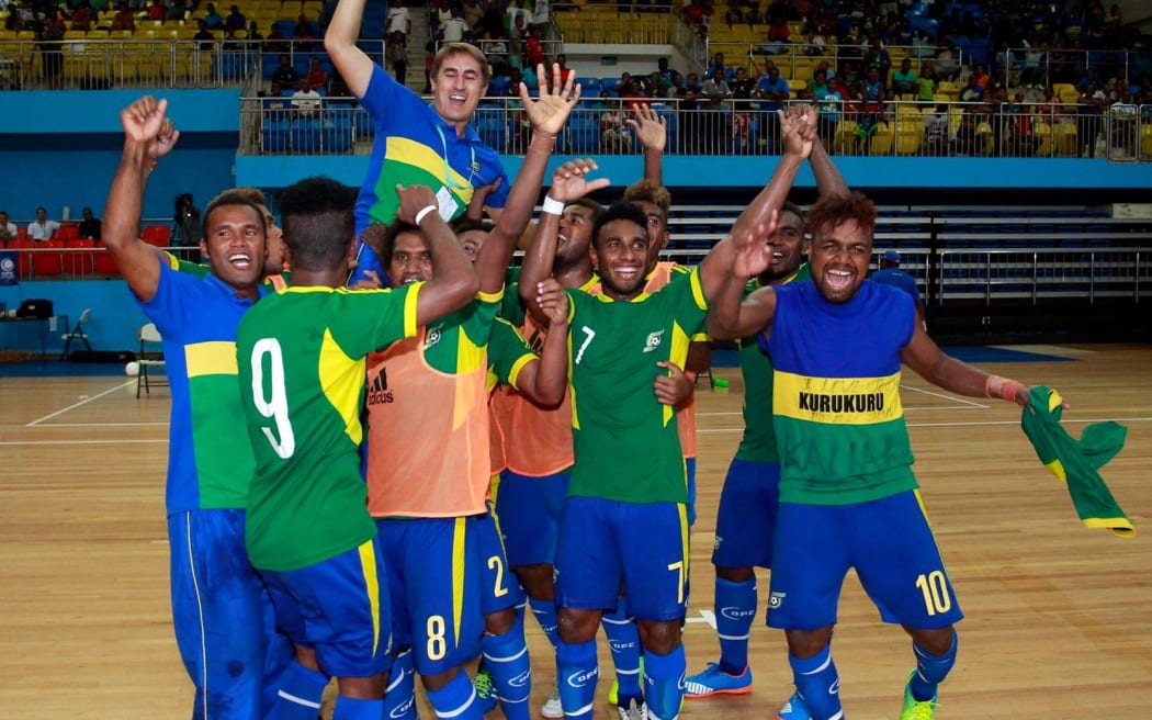The Solomon Islands Futsal team celebrate the 5-0 victory over Fiji and a 2016 OFC Championship.