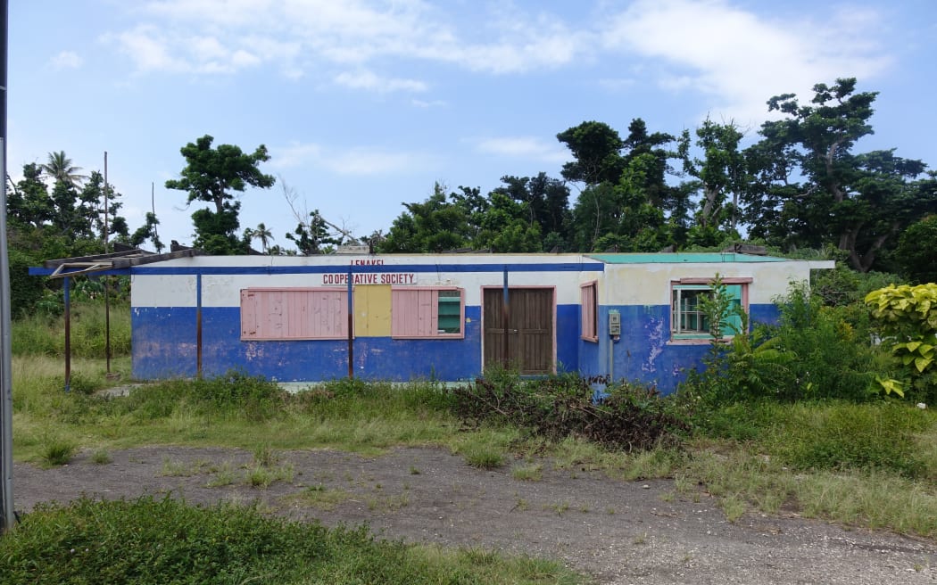 The Lenakel Cooperative Society building, which was damaged by cyclone Pam in Vanuatu, lies abandoned a year later.