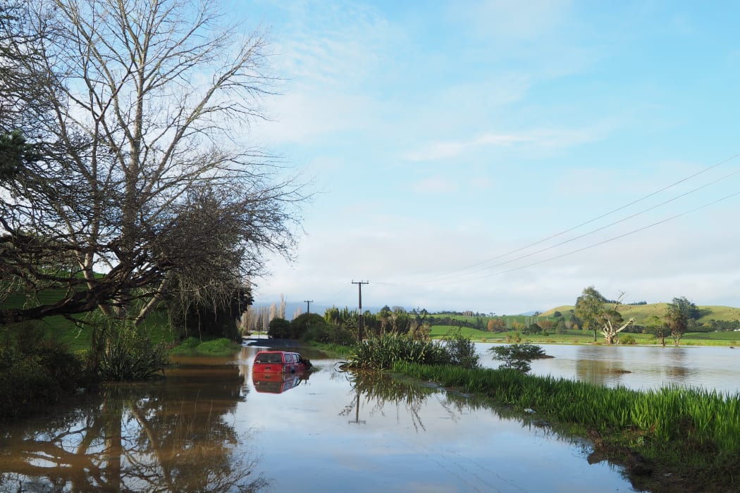 A truck that got stuck in floodwaters last night in Pamapuria near Kaitaia.