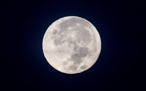 The supermoon seen in Yangon on 4 December.