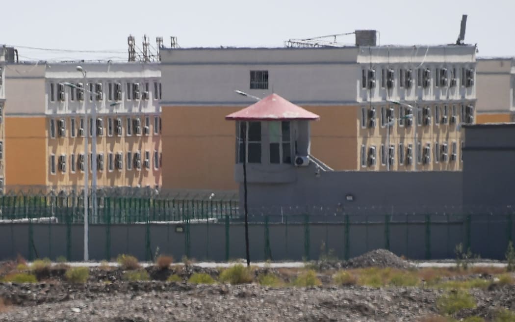 This photo taken on June 2, 2019 shows buildings at the Artux City Vocational Skills Education Training Service Center, believed to be a re-education camp where mostly Muslim ethnic minorities are detained, north of Kashgar in China's northwestern Xinjiang region. - As many as one million ethnic Uighurs and other mostly Muslim minorities are believed to be held in a network of internment camps in Xinjiang, but China has not given any figures and describes the facilities as Ã’vocational education centresÃ“ aimed at steering people away from extremism. (Photo by GREG BAKER / AFP) / TO GO WITH China-Xinjiang-media-rights-press,FOCUS by Eva XIAO        (Photo credit should read GREG BAKER/AFP via Getty Images)