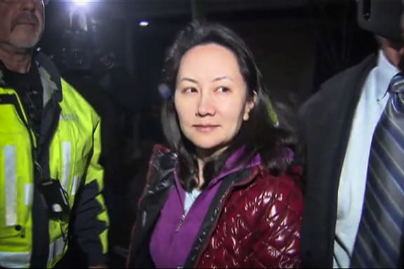 Huawei Technologies Chief Financial Officer Meng Wanzhou exits the court registry following a bail hearing at British Columbia Superior Courts in Vancouver on December 11, 2018.