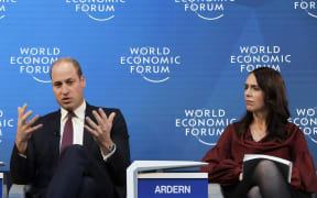 Prime Minister Jacinda Ardern listens as Prince William speaks while taking part in the Mental Health Matters panel at the World Economic Forum in Davos, Switzerland.