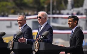 US President Joe Biden (centre) speaks alongside British Prime Minister Rishi Sunak (right) and Australian Prime Minister Anthony Albanese (left) at a press conference during the AUKUS summit on 13 March, 2023 (US time), at Naval Base Point Loma in San Diego California.