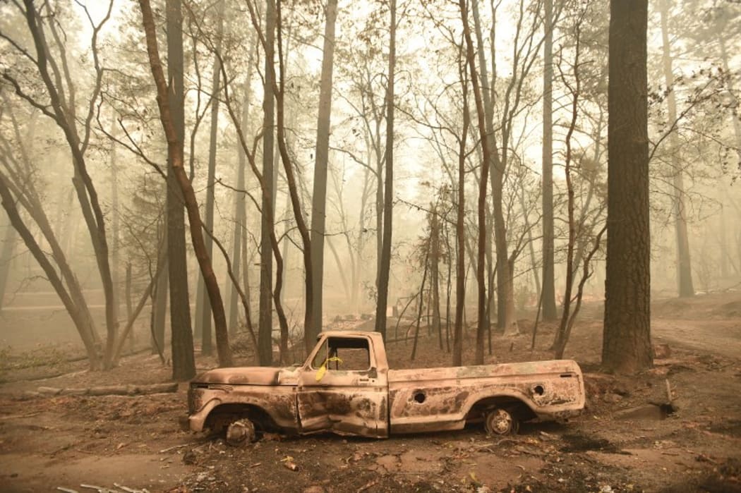 A burnt out truck is seen in Paradise, California after the Camp fire tore through the area.