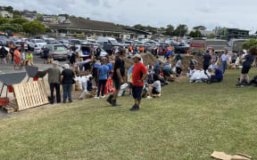 Aucklanders at the Windsor Park civil defence sand bag station, ahead of Cyclone Gabrielle.