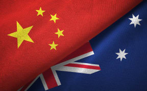 China and Australia flags.
