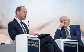 Prince William and Sir David Attenborough talk during the World Economic Forum (WEF) in Davos, Switzerland.