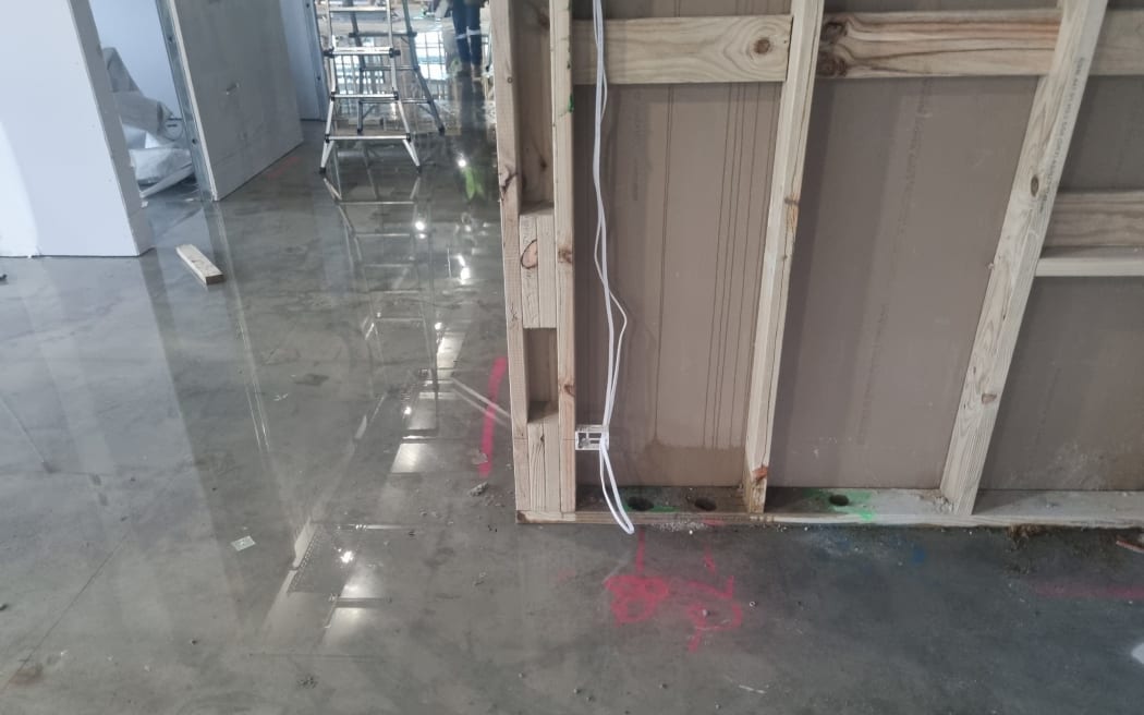 Water leaking into new Whangarei civic centre has caused problems. The leaking water can be clearly seen in this photo, on the floor and seeping up the wall.