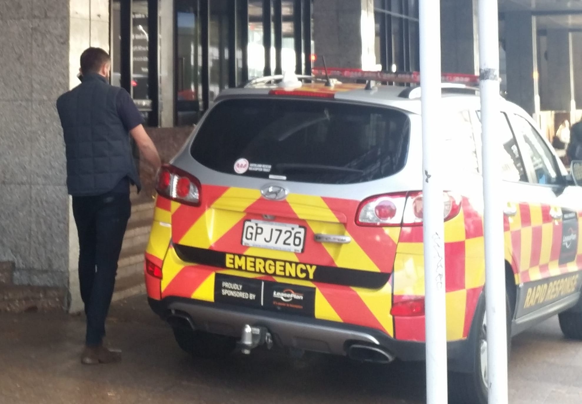 An emergency vehicle outside Auckland District Court today.