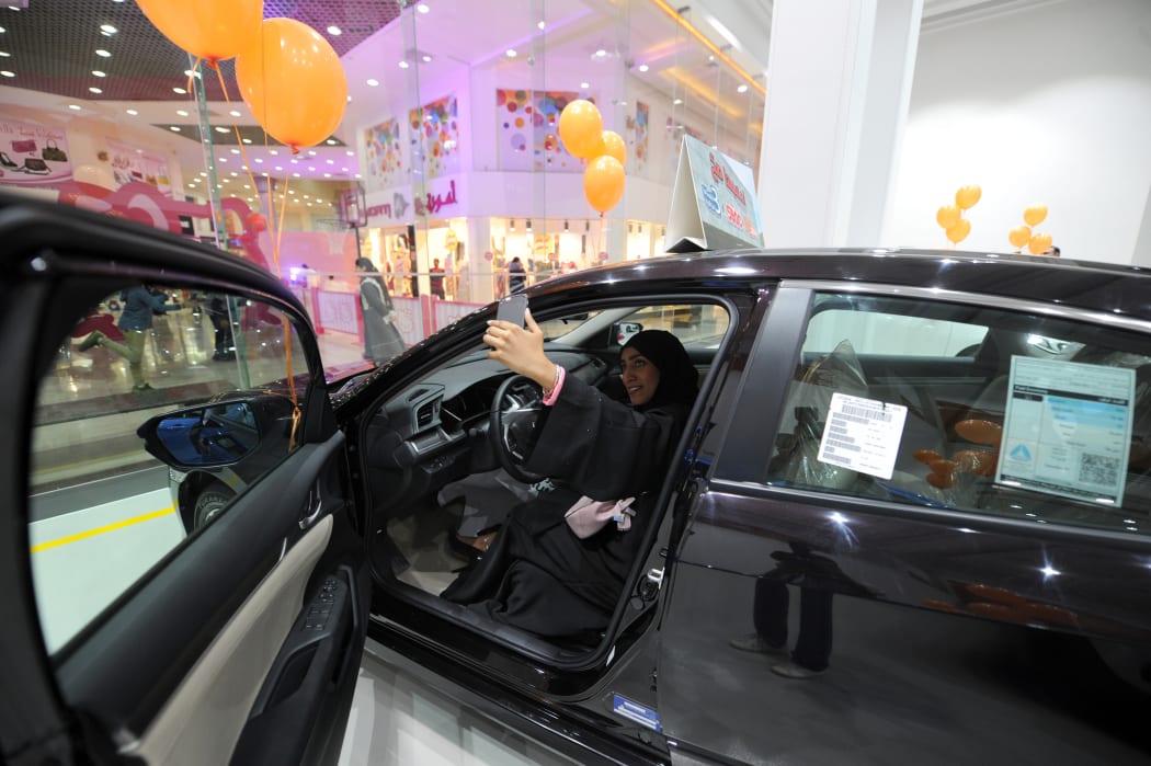 Saudi women tour the car showroom for women in the Saudi Red Sea port city of Jeddah.