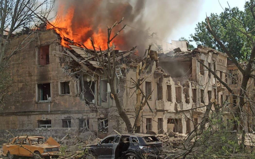 This handout photograph released on May 26, 2023 by the Telegram account of Serhiy Lysak, the head of the Dnipropetrovks Regional Military Administration, shows the fire at a medical facility, the site of a missile strike, in the city of Dnipro, amid the Russian invasion of Ukraine. (Photo by Handout / Telegram account of Serhiy Lysak, head of the Dnipropetrovks regional military administration / AFP)