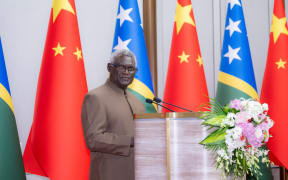 (230711) -- BEIJING, July 11, 2023 (Xinhua) -- Manasseh Sogavare, the prime minister of Solomon Islands, addresses the inauguration ceremony of Solomon Islands embassy in Beijing, capital of China, July 11, 2023. Sogavare and Wang Yi, a member of the Political Bureau of the Communist Party of China (CPC) Central Committee and director of the Office of the Foreign Affairs Commission of the CPC Central Committee, jointly unveiled the nameplate of the embassy. (Xinhua/Zhai Jianlan) (Photo by Zhai Jianlan / XINHUA / Xinhua via AFP)