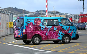 Rental van leaving the Bluebridge in Wellington; tourists; backpacker; travelling