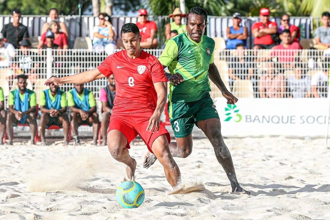 Tahiti's Heiarii Tavanae gets the better of Vanuatu's Ivong Wilson. OFC Beach Soccer Nations Cup 2019, Tahiti v Vanuatu, Aorai Tini Hau, Tahiti, Monday 17th June 2019.