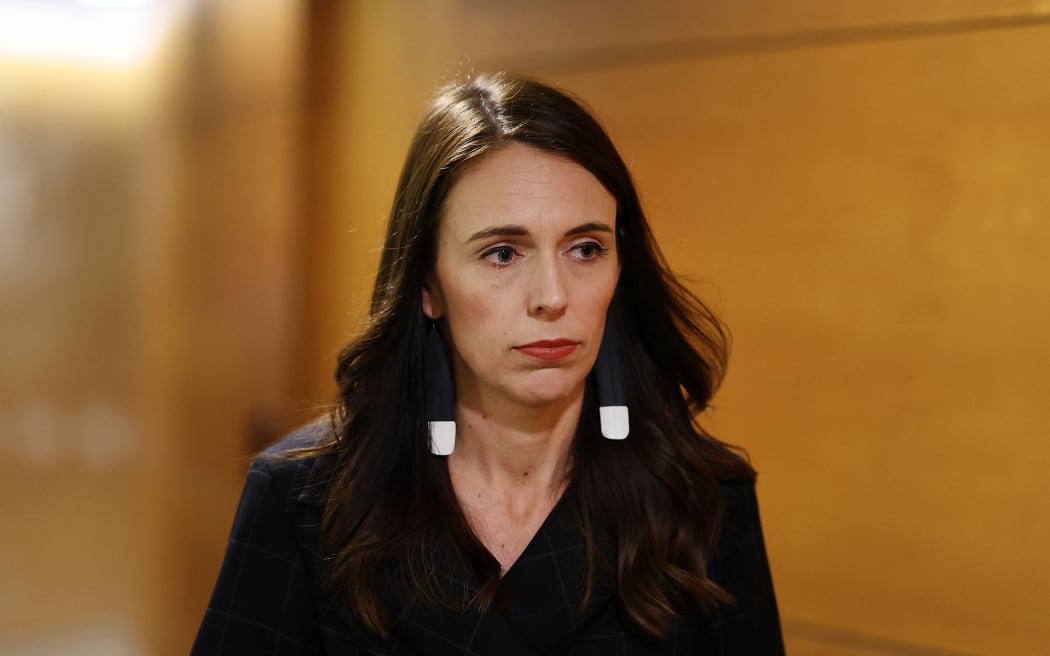 (FILES) In this file photo taken on November 30, 2020, New Zealand's Prime Minister Jacinda Ardern arrives for a press conference to speak about the charges laid over the 2019 White Island volcanic eruption, in Wellington. - New Zealand Prime Minister Jacinda Ardern announced on January 19, 2023 she will resign next month.
