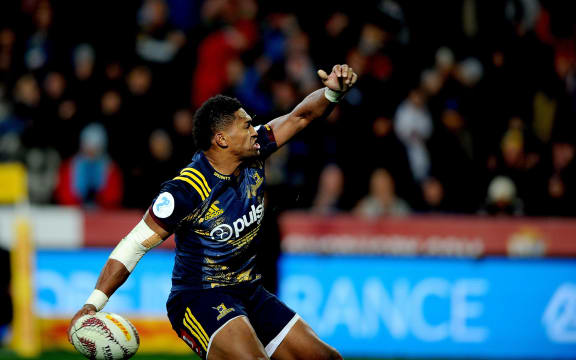 Highlanders winger Waisake Naholo celebrates a try against the British and Irish Lions.