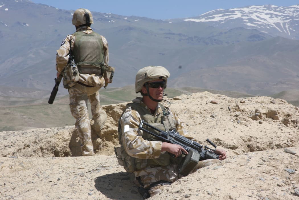 Two members of the New Zealand Provincial Reconstruction Team provide security in Shebar district, Bamiyan province, Afghanistan..