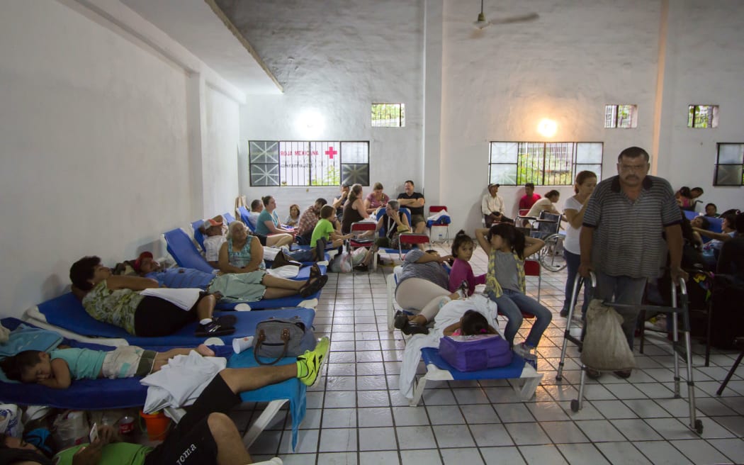 Evacuees remain at a shelter in Puerto Vallarta, Mexico on October 23 ,2015, during hurricane Patricia