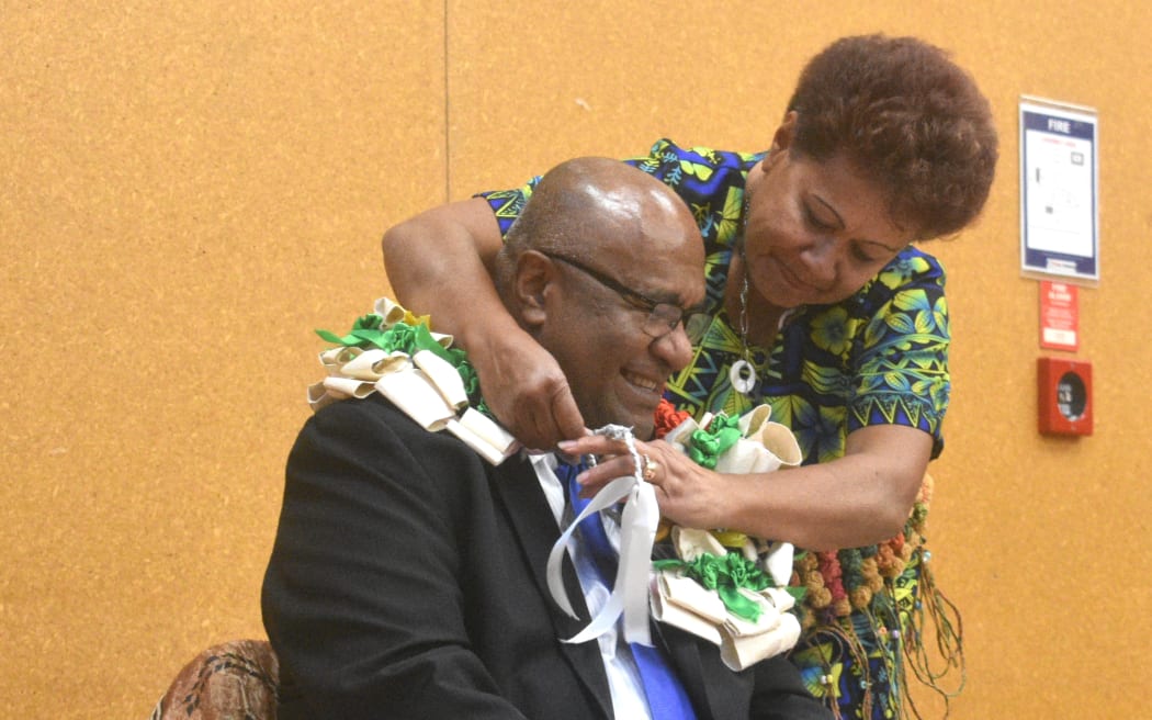 Manoa Kamikamica is garlanded during his meeting with the Fijian community in Wellington