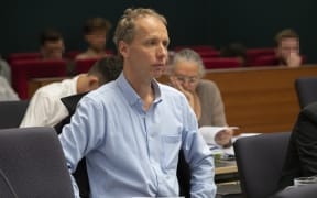 Author Nicky Hager listening to Kristy McDonald QC during her submissions at the Operation Burnham Inquiry at the High Court in Wellington.