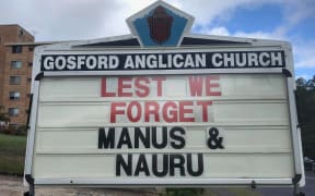 The Anzac day sign outside Gosford church.